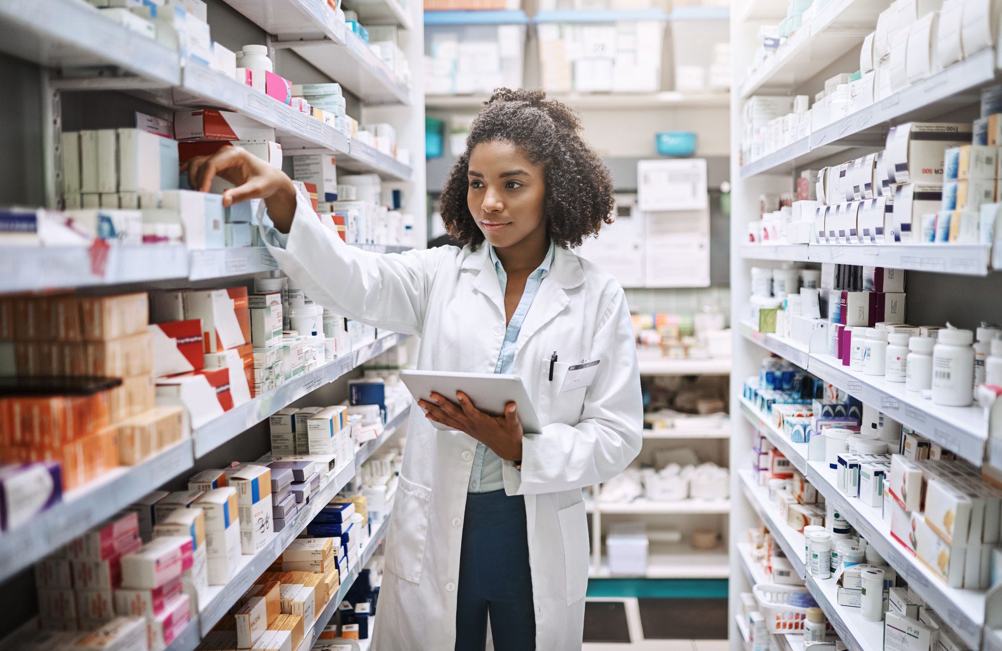 Cropped shot of a young female pharmacist working in a pharmacy.